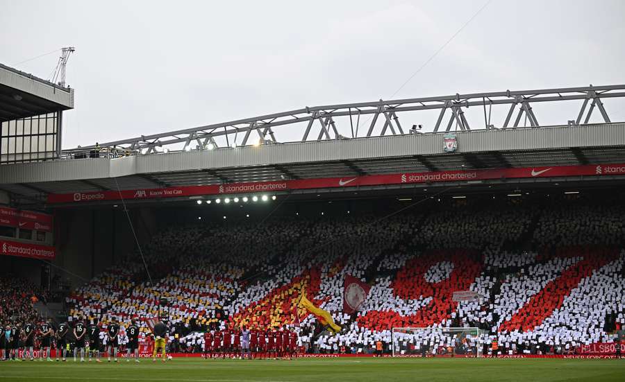 Players observe a minute's silence to remember the victims of the Hillsborough disaster, ahead of the English Premier League football match between Liverpool and Arsenal at Anfield