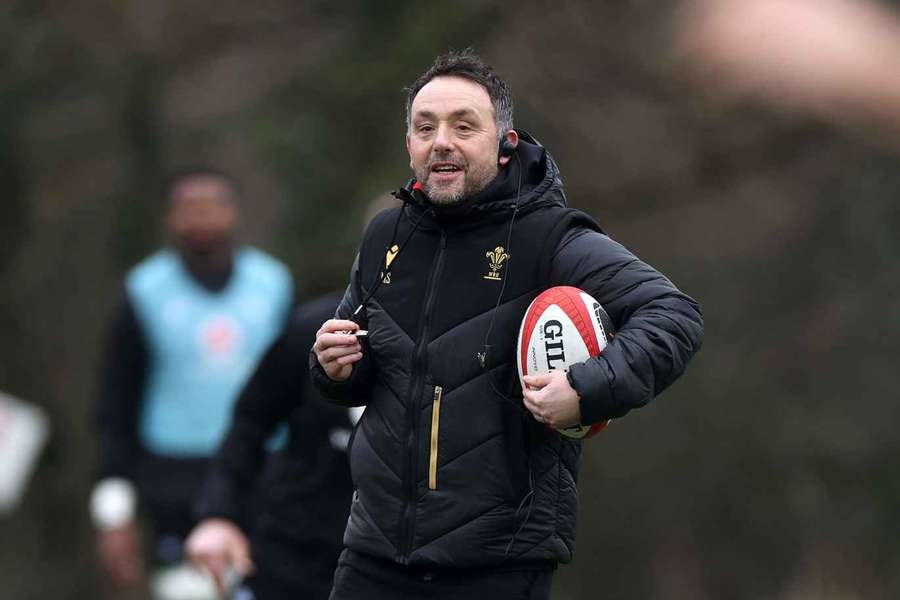 Sherratt coaches a training session with Wales