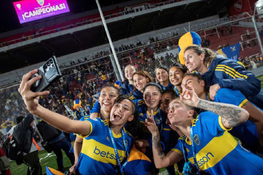 Boca Juniors defender Julieta Cruz celebrates with her teammates after winning the women's soccer championship final against UAI Urquiza