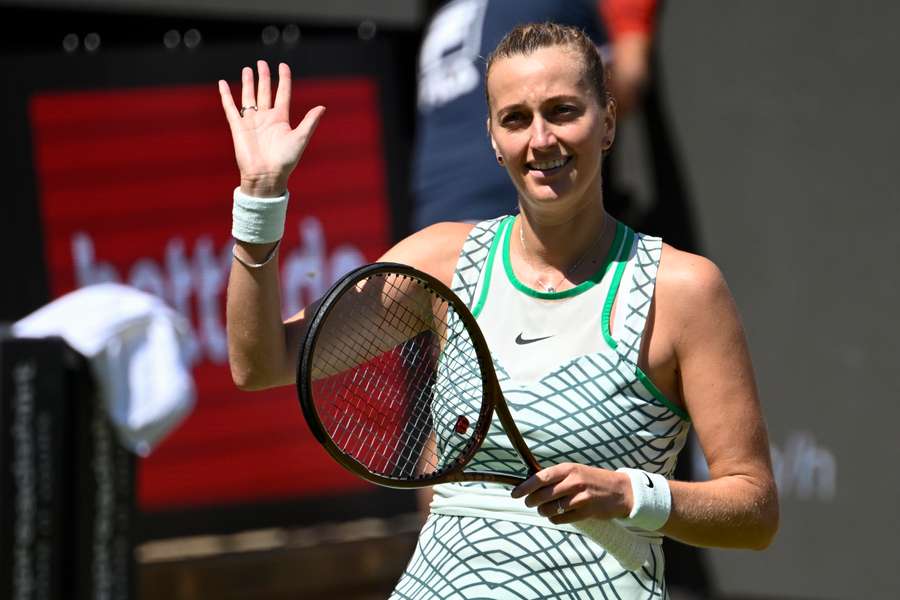 Petra Kvitova celebrates beating Caroline Garcia to reach the semi-final