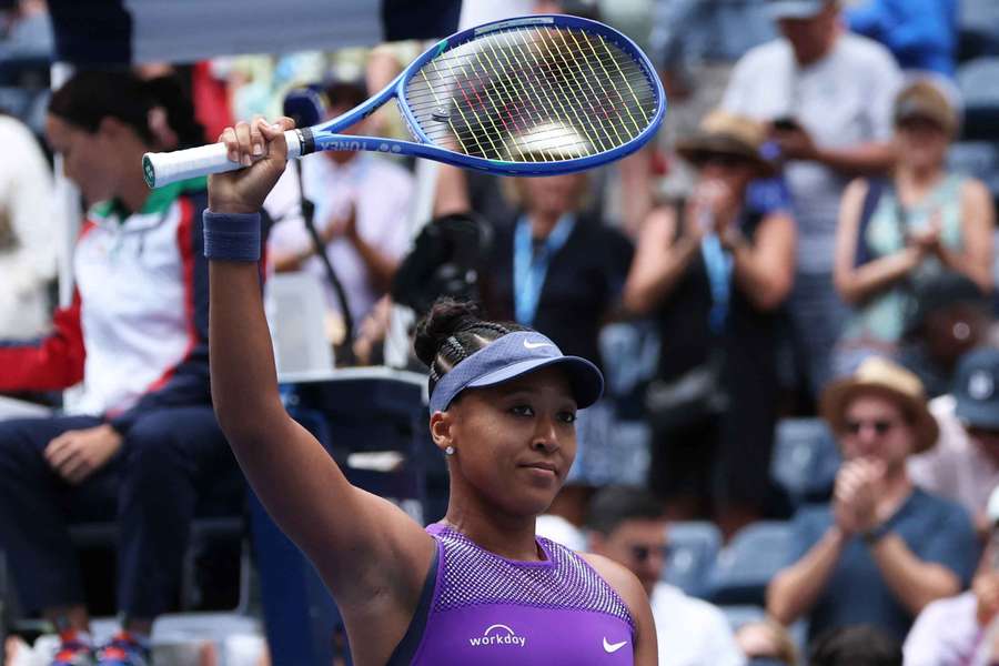 Naomi Osaka celebrates her win
