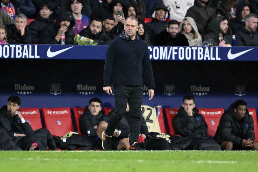 Hansi Flick on the touchline of Barcelona's heavy Copa del Rey loss at Atletico Madrid.