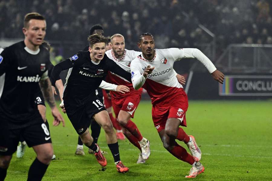 Sebastien Haller (R) of FC Utrecht battles with AZ defender Wouter Goes during a corner 