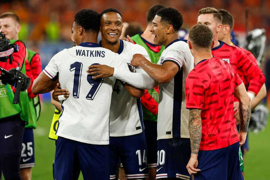 England's players celebrate winning their semi-final