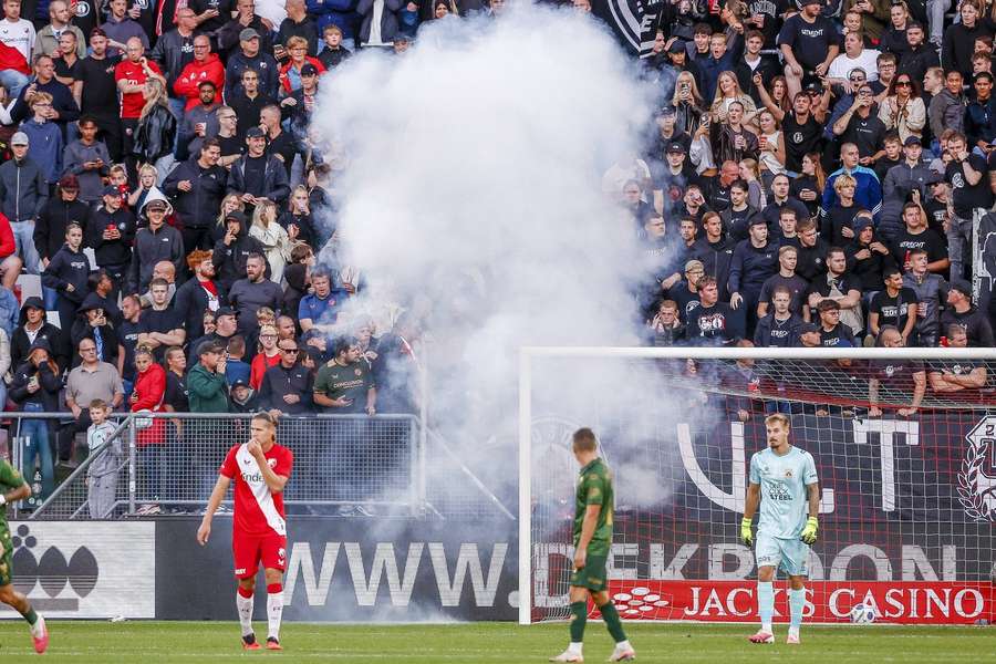 FC Utrecht fans threw fireworks onto the pitch FC Utrecht fans threw fireworks onto the pitch