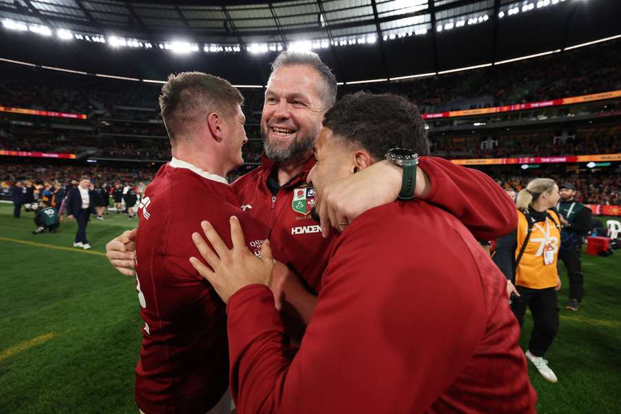 Andy Farrell, Owen Farrell and Sione Tuipulotu celebrate