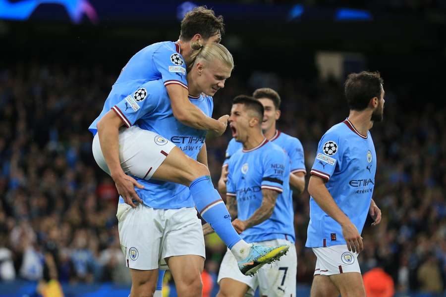 Haaland celebrates after putting Man City 2-1 up against Borussia Dortmund.