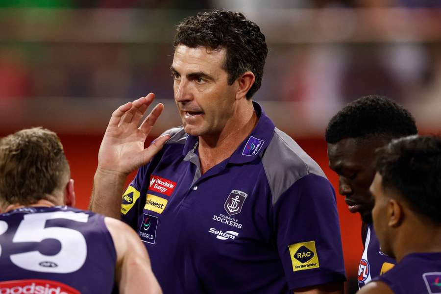 Jaymie Graham speaking to Fremantle players during their preliminary final win. Jaymie Graham speaking to Fremantle players during their preliminary final win.