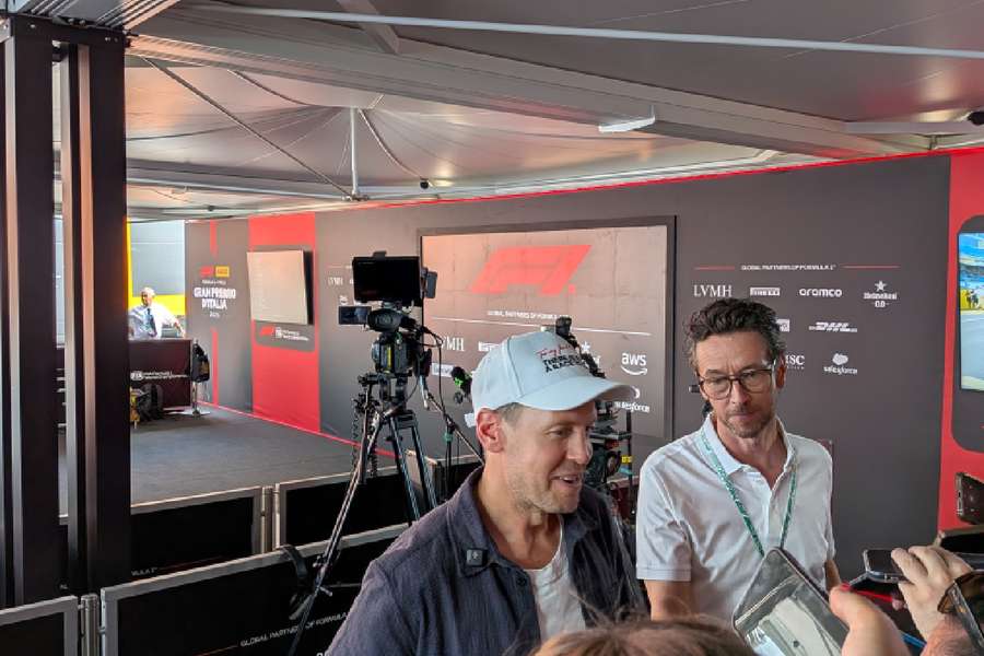 Sebastian Vettel was speaking to the media