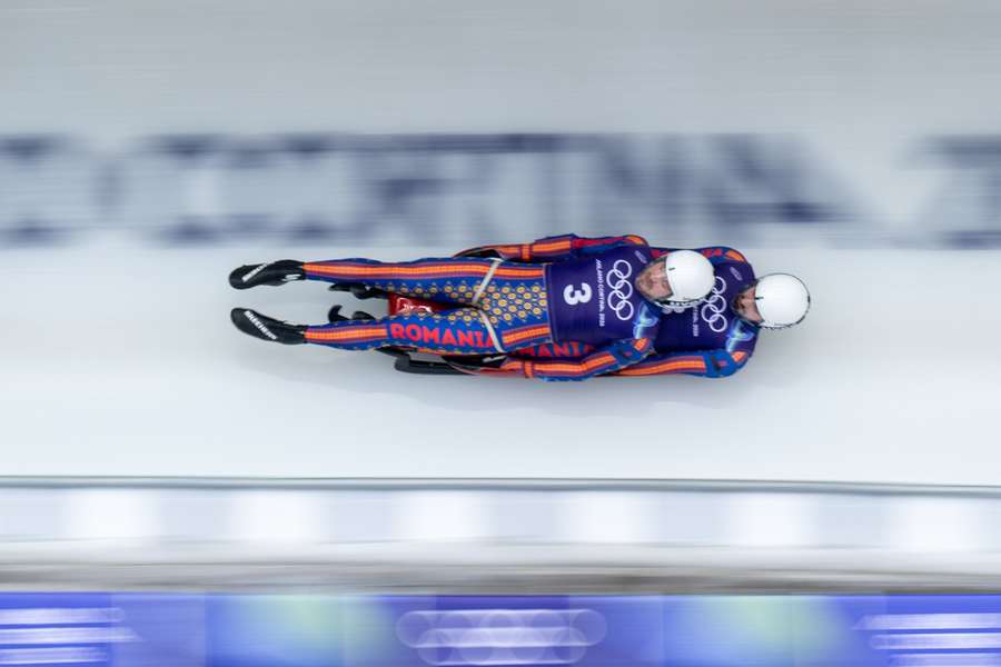 Vasile-Marian Gîtlan şi Darius-Lucian Şerban, în timpul probei de la JO Milano-Cortina 2026