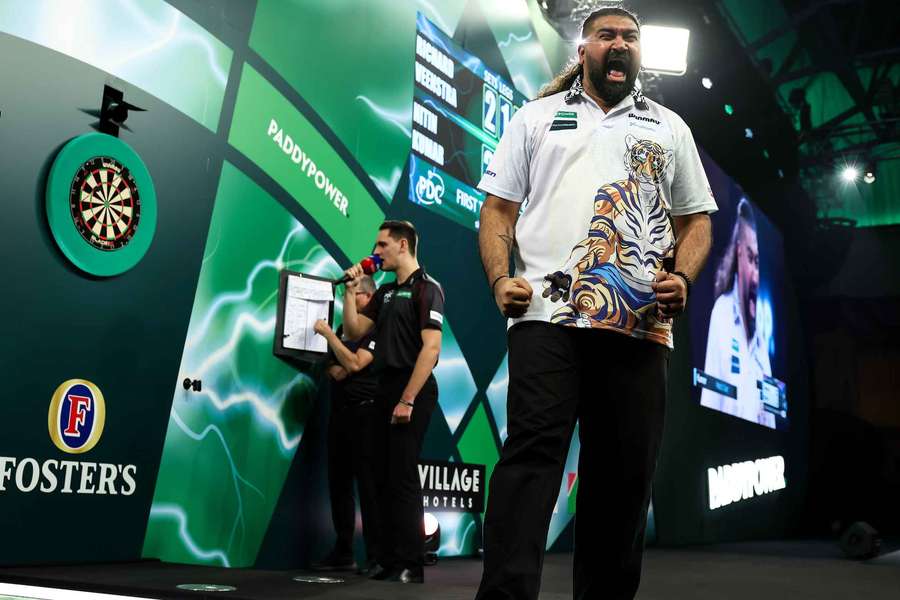 Nitin Kumar celebrates his victory against Richard Veenstra Nitin Kumar celebrates his victory against Richard Veenstra