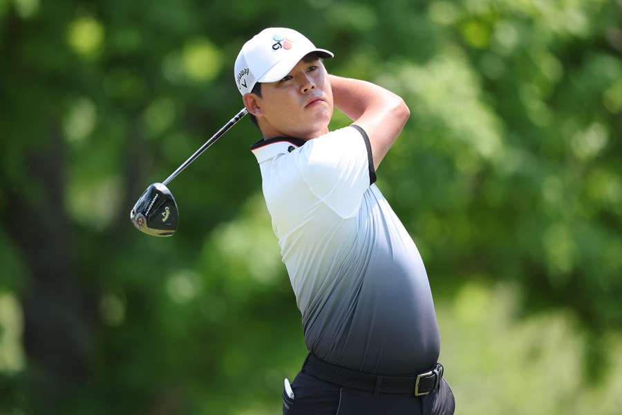 Kim Si-Woo of South Korea hits a tee shot