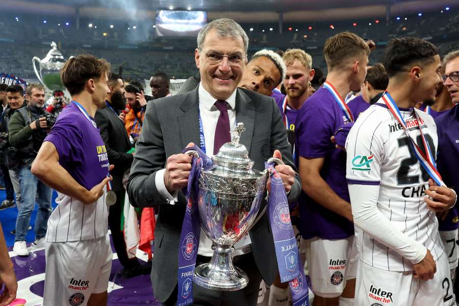 Damien Comolli holds the French Cup after Toulouse won the competition last season