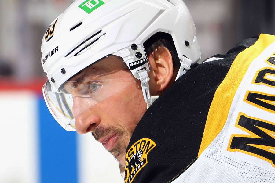 Now former Boston Bruins Brad Marchand looking on before a face-off (2025)