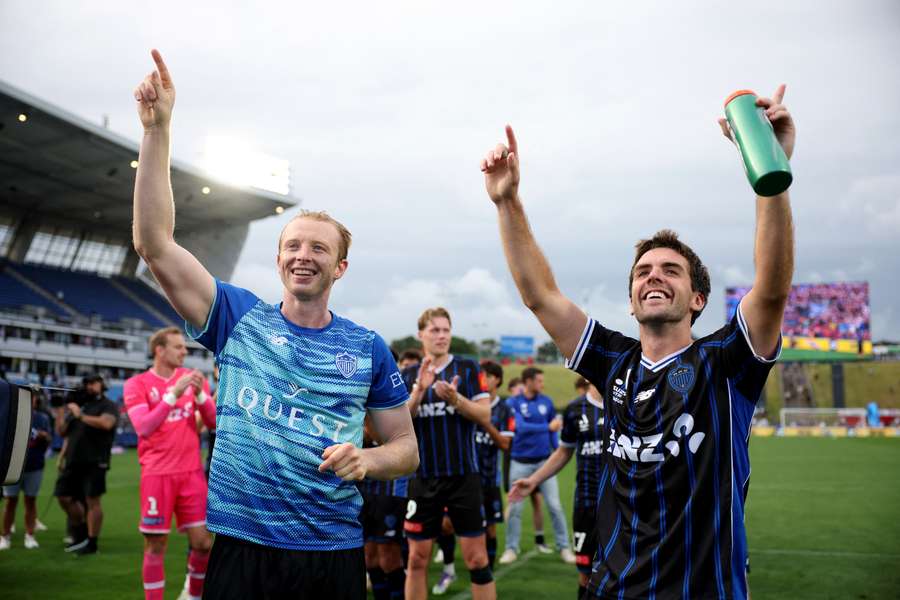Francis de Vries and Guillermo May celebrate Auckland's second straight win.