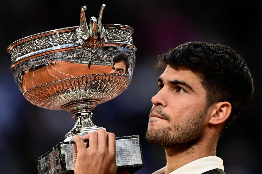 Carlos Alcaraz celebrates in the French Open final