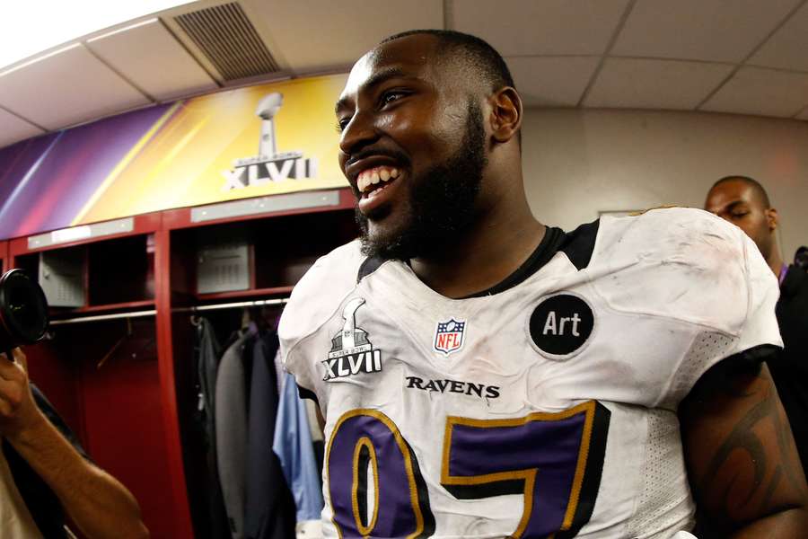 Arthur Jones smiling after the Ravens beat the 49ers in Super Bowl XLVII (2013)