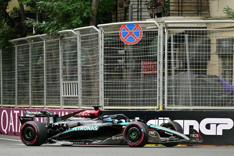 Mercedes' George Russell steers his car during the third practice session