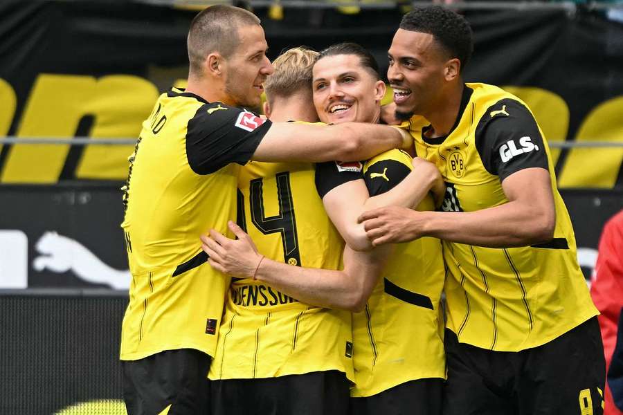 Le Borussia Dortmund s'est imposé samedi sur sa pelouse contre Kiel (3-0) et arraché sa qualification pour la prochaine Ligue des champions. 