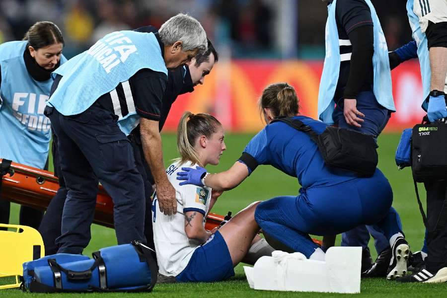 Walsh was stretchered off against Denmark