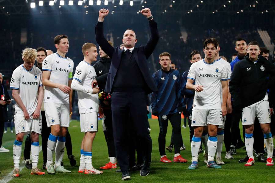 Hayen and his players celebrate with their fans