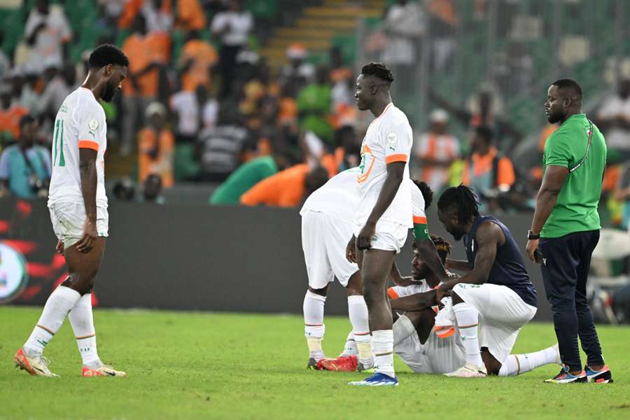 Dejected Ivorian players after their 4-0 loss to Equatorial Guinea Dejected Ivorian players after their 4-0 loss to Equatorial Guinea