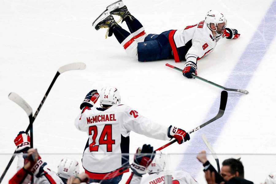 Alex Ovechkin of the Washington Capitals celebrates after scoring his 895th career goal against the New York Islanders