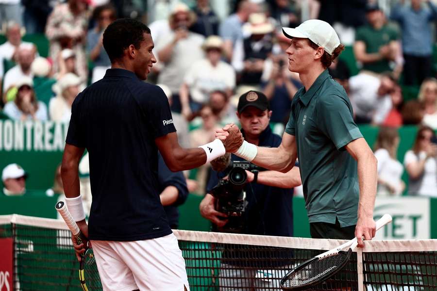 Auger-Aliassime and Sinner shake hands Auger-Aliassime and Sinner shake hands