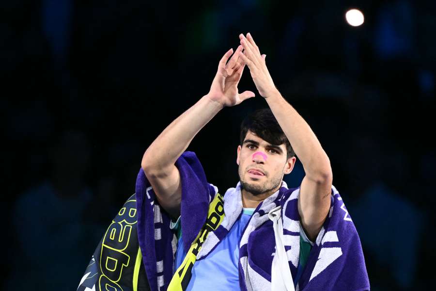 Spain's Carlos Alcaraz greets fans after being defeated by Germany's Alexander Zverev 