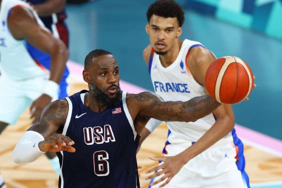  Lebron James of United States in action with Victor Wembanyama of France