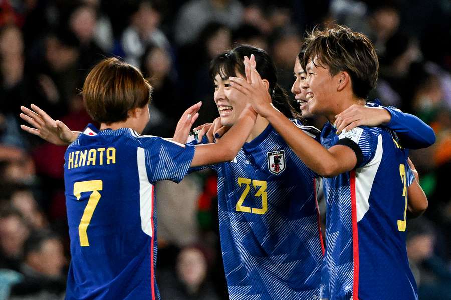 Japan's players celebrate their dominant victory