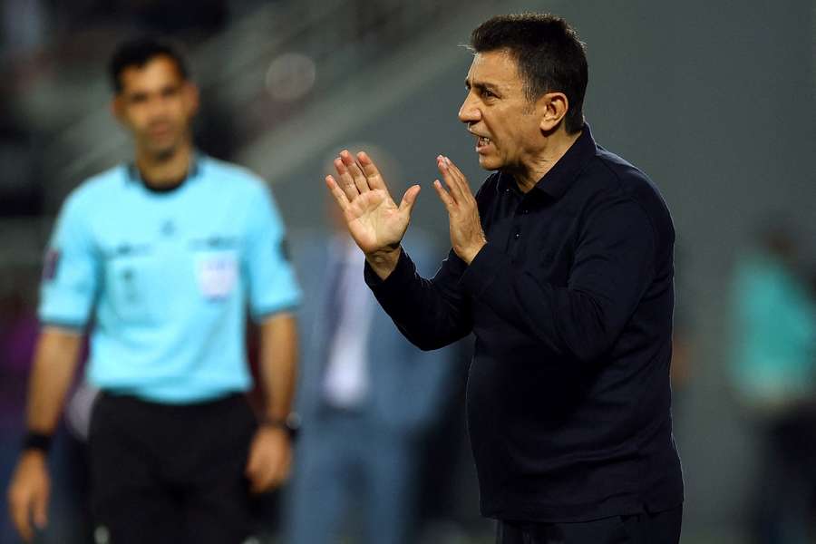  Iran coach Amir Ghalenoei reacts