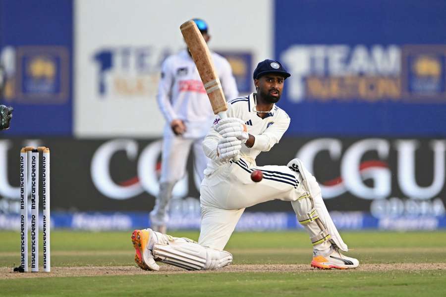 India's Manav Suthar plays a shot during the second day of the first Test against Sri Lanka India's Manav Suthar plays a shot during the second day of the first Test against Sri Lanka
