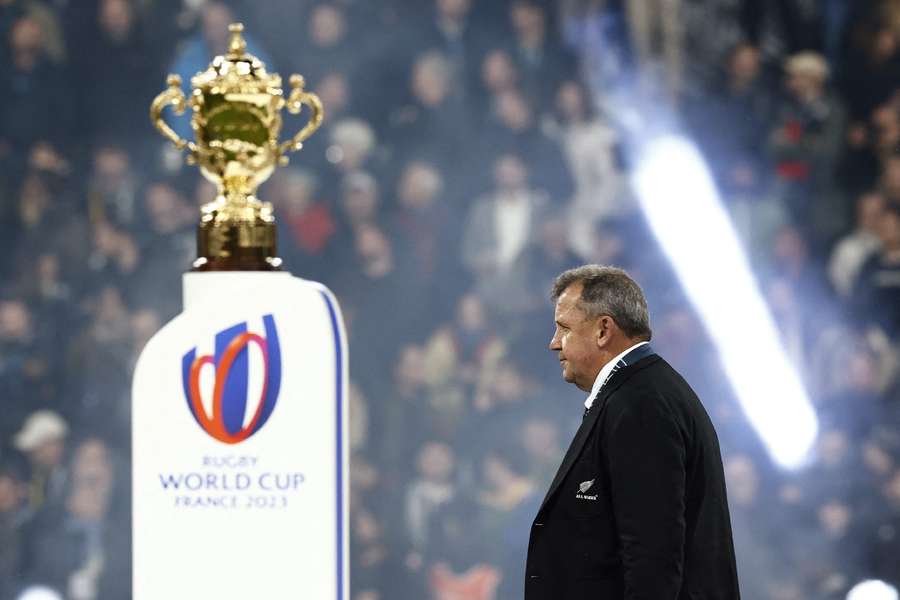 New Zealand head coach Ian Foster walks past The Webb Ellis Cup during the trophy presentation