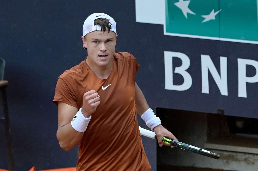 Holger Rune beat Novak Djokovic in the first men's quarter-final in Rome