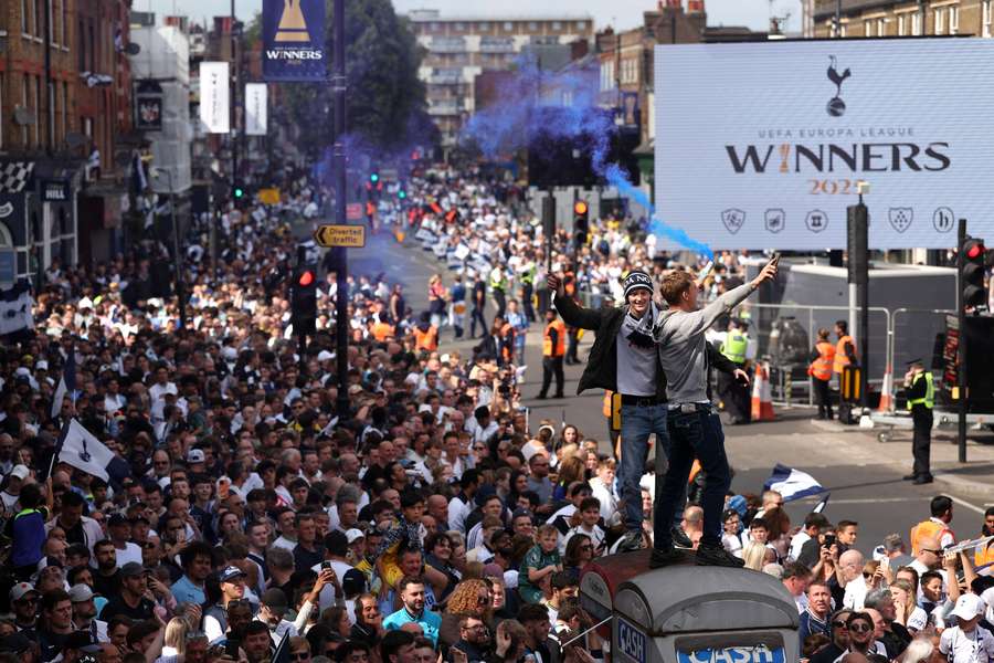 A general view as fans release pyrotechnics prior to the Tottenham Hotspur UEFA Europa League trophy parade A general view as fans release pyrotechnics prior to the Tottenham Hotspur UEFA Europa League trophy parade