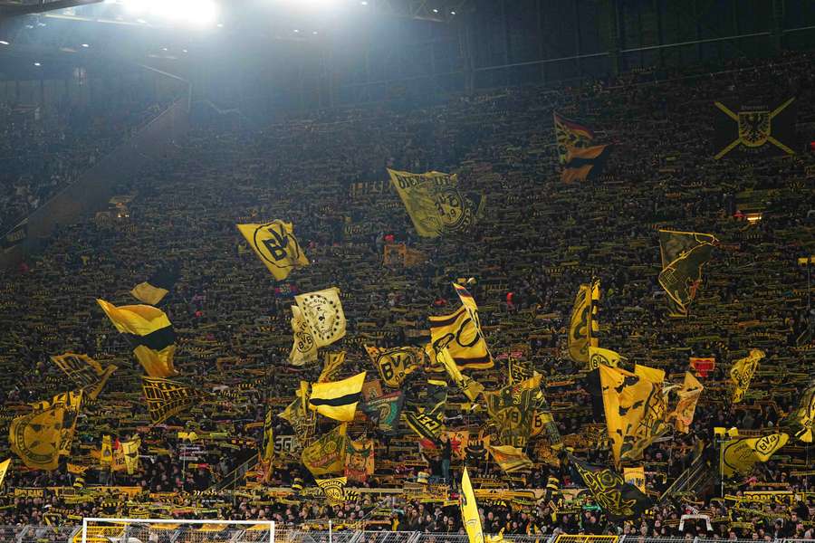 Dortmund fans celebrate after the match