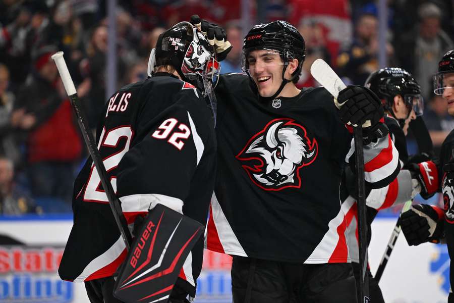 Colten Ellis (left) and Peyton Krebs (right) celebrate Sabres win over Canadiens