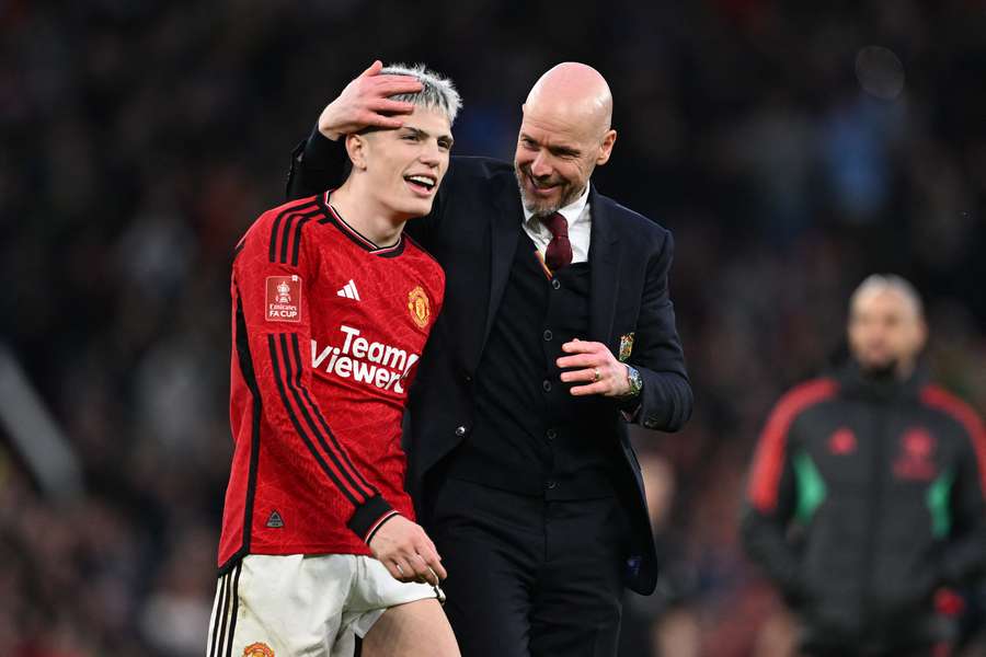 Erik ten Hag (R) embracing Alejandro Garnacho after Man United's victory over Liverpool in the FA Cup