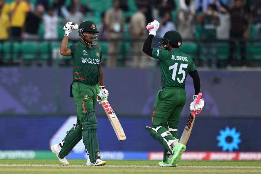 Bangladesh's Mushfiqur Rahim (R) and Najmul Hossain Shanto celebrate