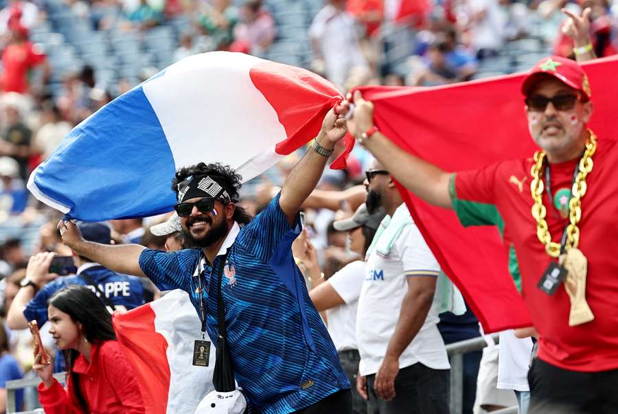 France and Morocco fans with flags inside the stadium France and Morocco fans with flags inside the stadium