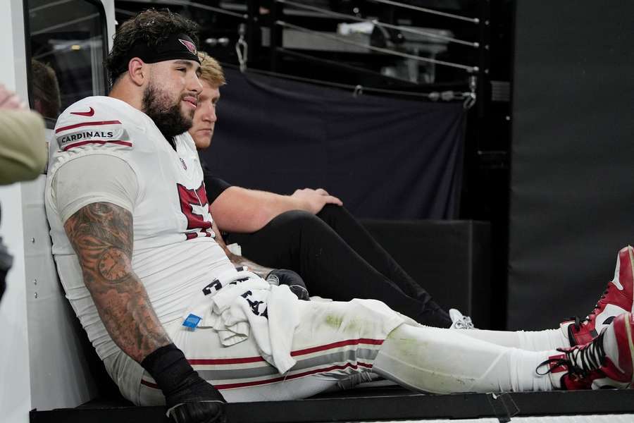 Cardinals guard Chase Bisontis on a cart Cardinals guard Chase Bisontis on a cart