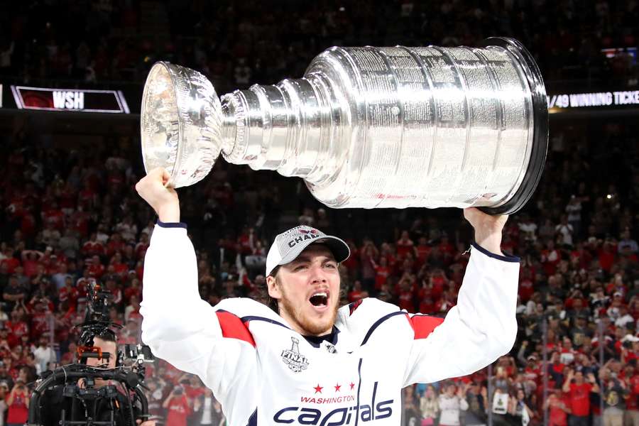T.J. Oshie lifting the Stanley Cup after winning in 2018 with the Washington Capitals