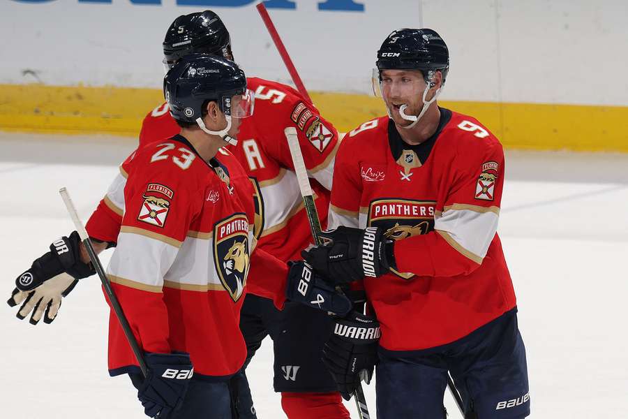 Florida players Bennett and Verhaeghe celebrate after scoring against Toronto