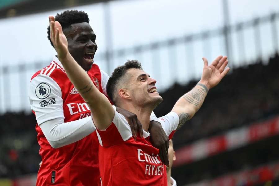 Xhaka celebrates scoring Arsenal's fourth with Saka