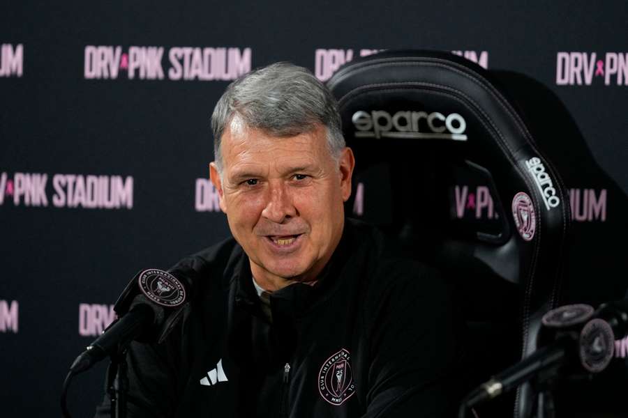 Gerardo “Tata” Martino speaking at a press conference at DRV PNK Stadium