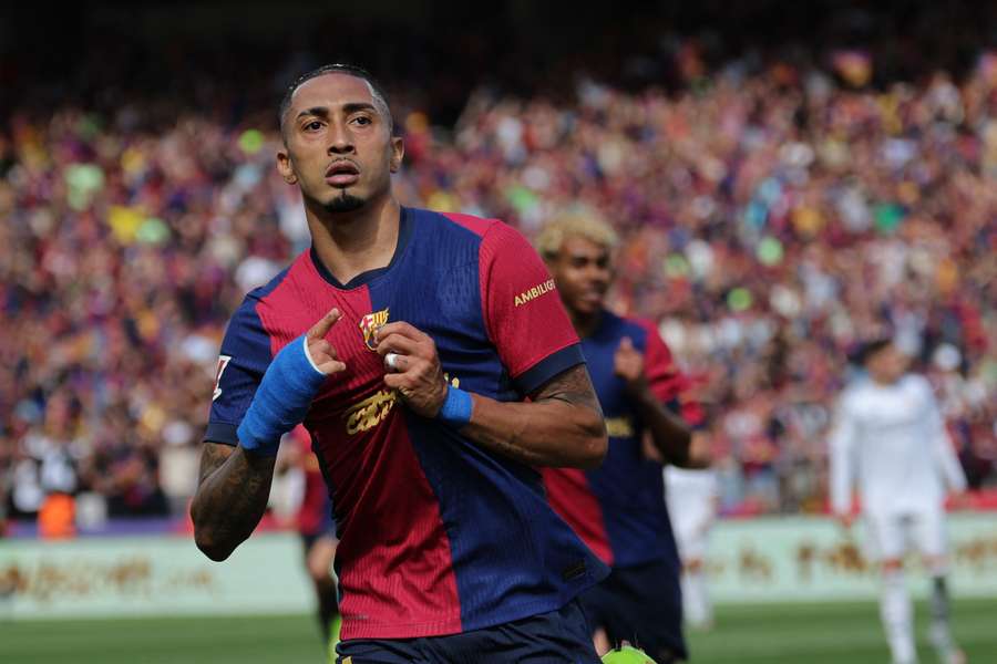 Raphinha celebrates scoring against Real Madrid earlier this month