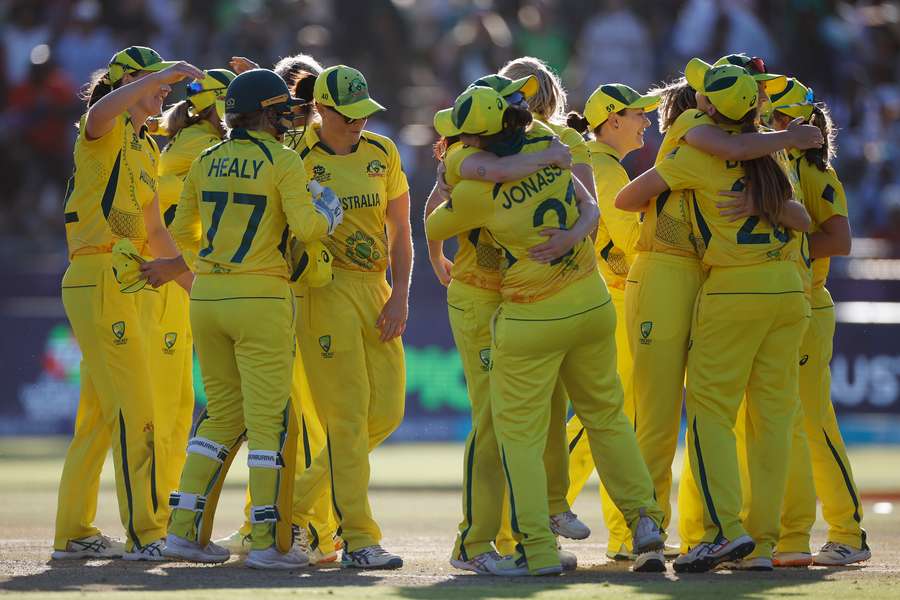 Australia players celebrate after they won the Women's T20 World Cup final