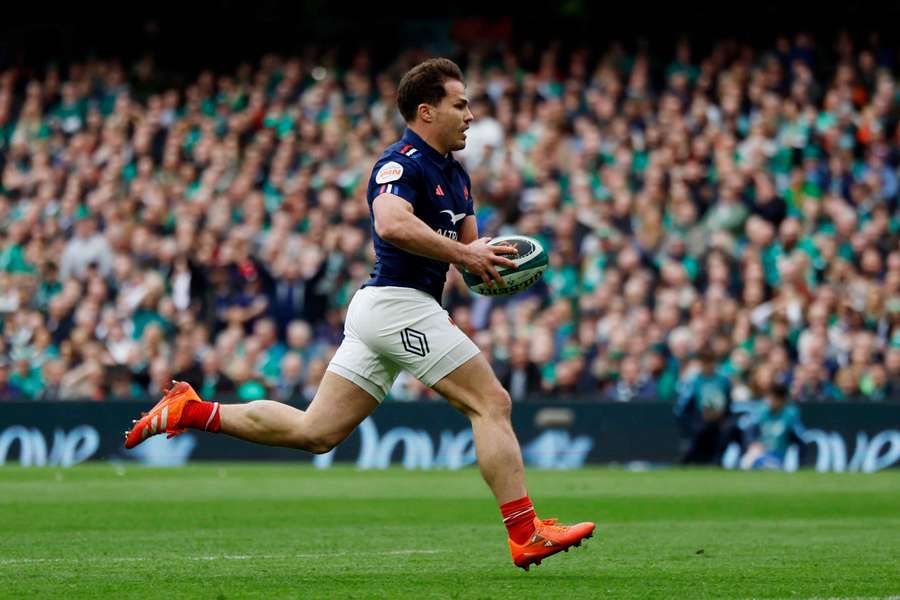 France's Antoine Dupont scores a try against Ireland which is later disallowed