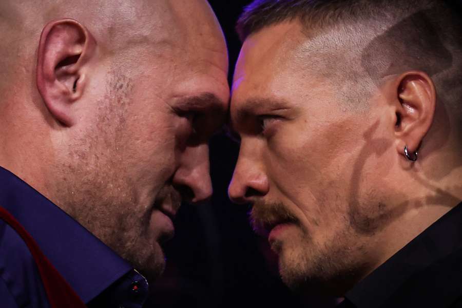 Britain's Tyson Fury (L) and Ukraine's Oleksandr Usyk (R) challenge each other during a press conference in London on November 16th, 2023
